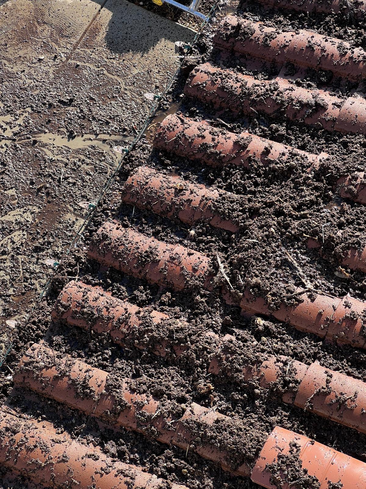 Roof tile debris removal